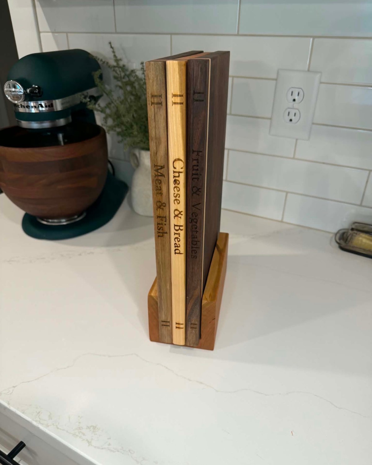 Meat & Fish, Cheese & Bread and Fruit & Vegetables hardwood boards in their cherry stand