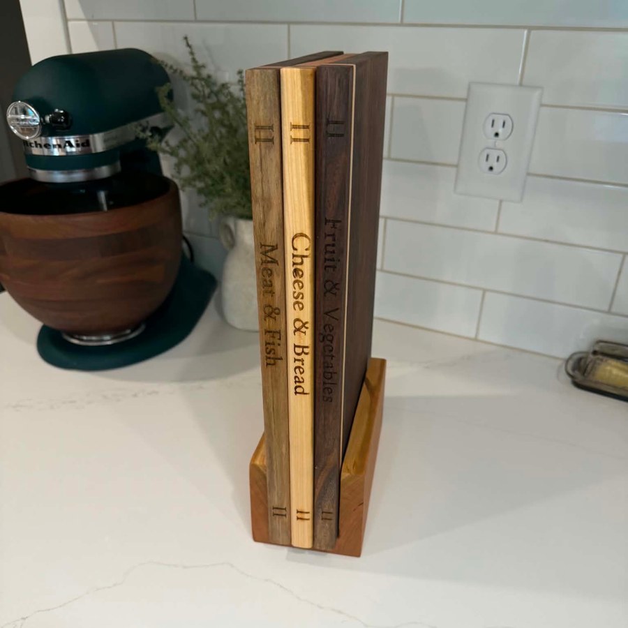 The Everyday Board Set standing in its cherry stand